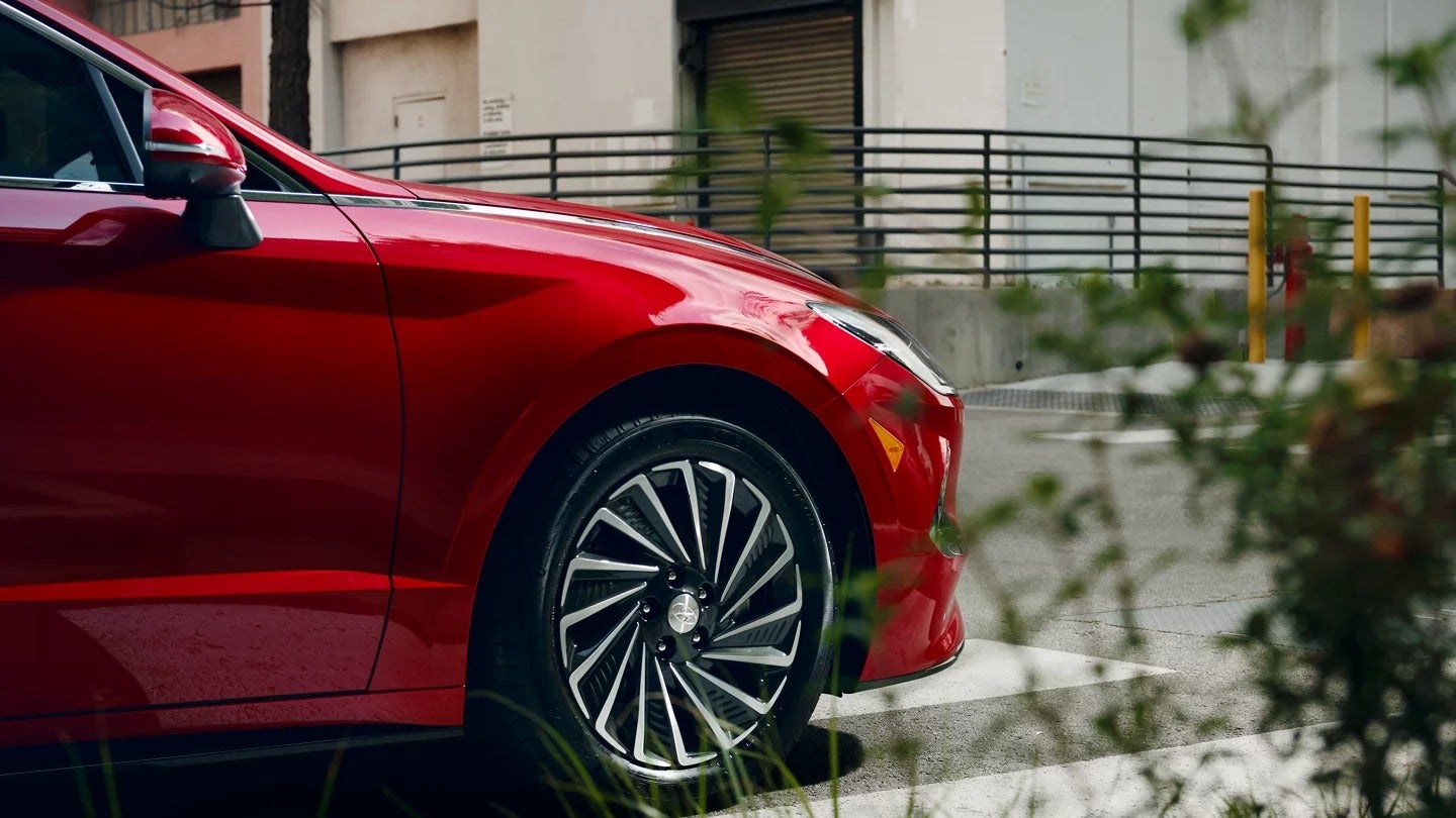Front passenger side wheel well and tire of the Hyundai Sonata Hybrid