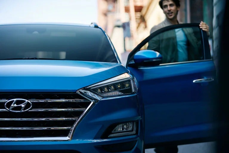 Passenger opening Hyundai vehicle door
