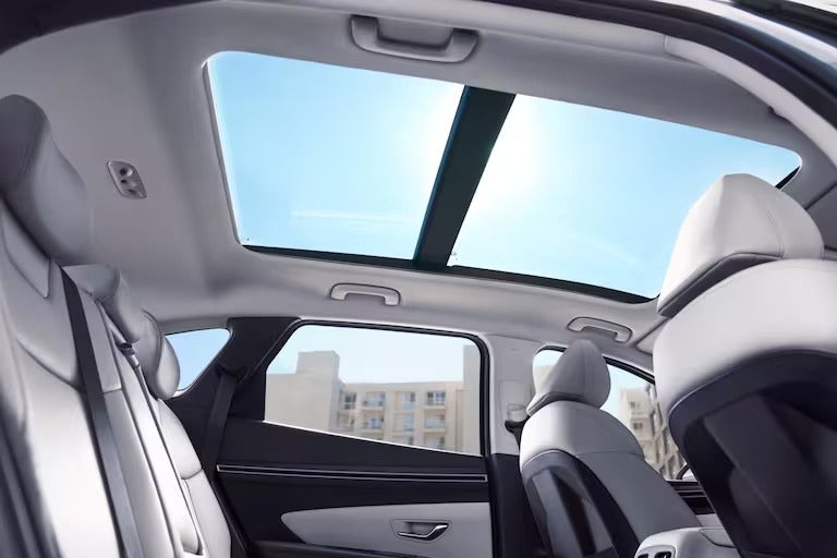 Interior view looking up to sunroof in a Hyundai Tucson